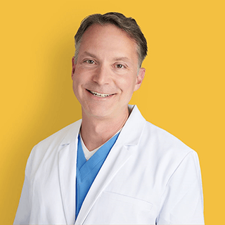 Dr. J&uuml;rgen Runschke, board-certified vein specialist in Grand Rapids, MI